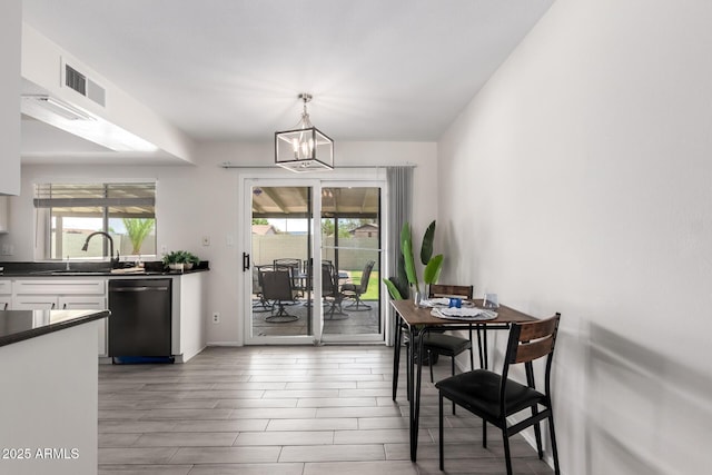 19031 N 13th Dr, Phoenix, AZ 85027 - dining space with a chandelier and wood finished floors