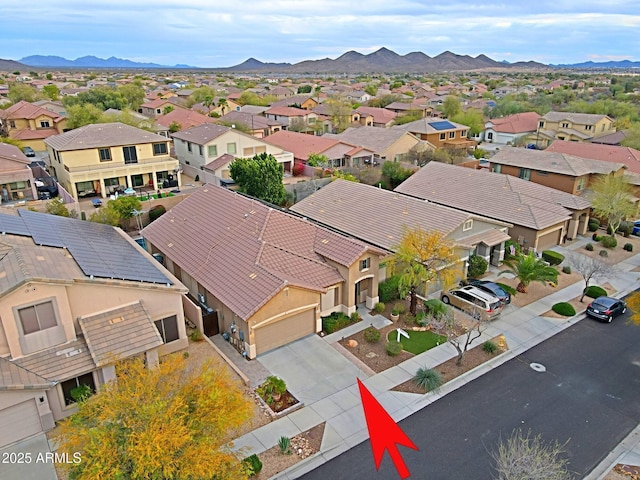 birds eye view of property featuring a residential view and a mountain view