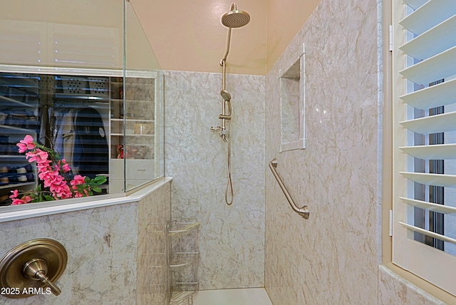 bathroom featuring a walk in shower