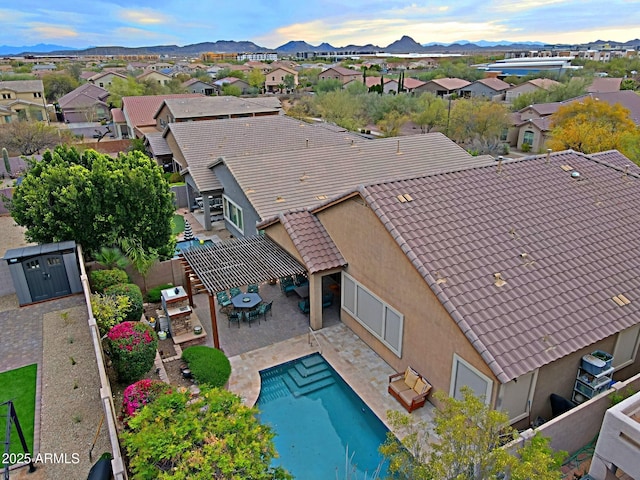 bird's eye view featuring a mountain view and a residential view