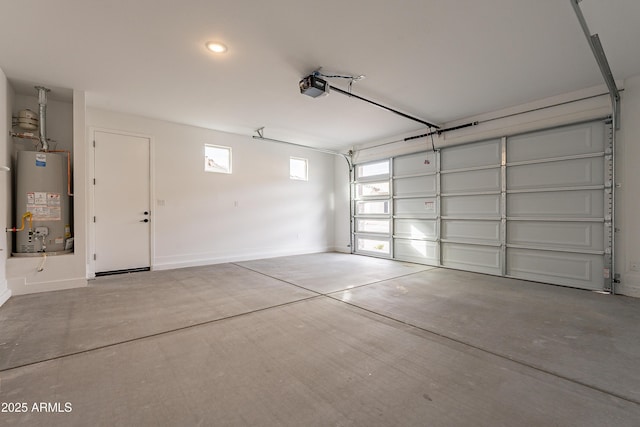 21411 W Meadowbrook Ave, Buckeye, AZ 85396 - garage featuring water heater, a garage door opener, and recessed lighting