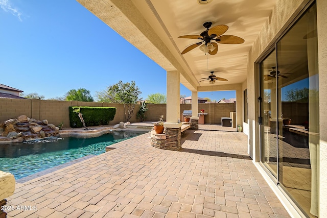 exterior space with a fenced backyard, a fenced in pool, a ceiling fan, and a patio