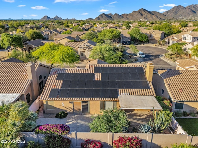 aerial view of residential area with a mountain backdrop