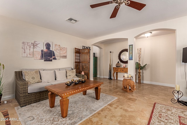 living room featuring ceiling fan