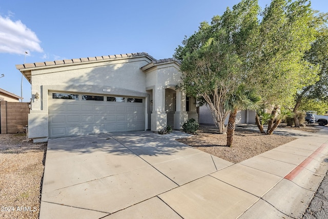 view of front of home with a garage