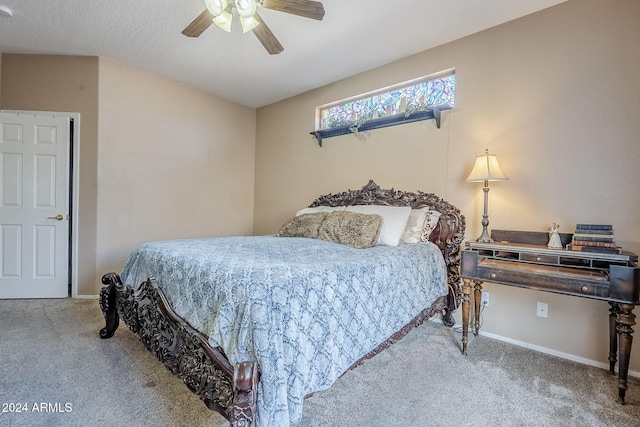 bedroom with ceiling fan and carpet floors