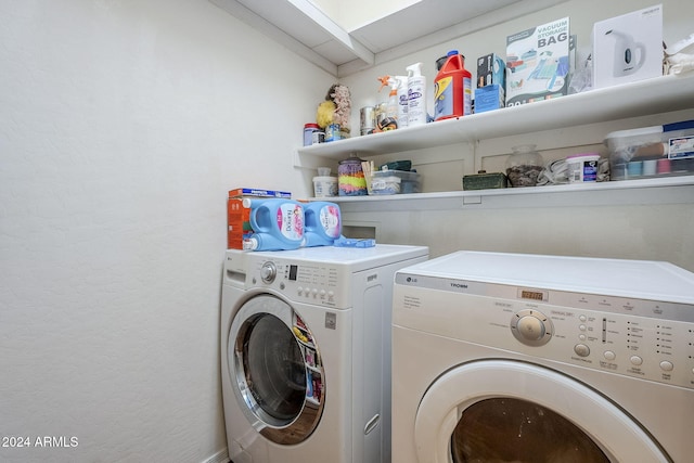 washroom featuring independent washer and dryer