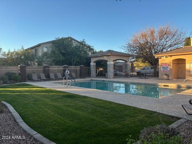 view of pool with a gazebo, a yard, and a patio