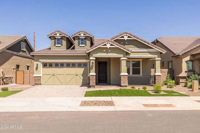 craftsman-style house featuring a garage