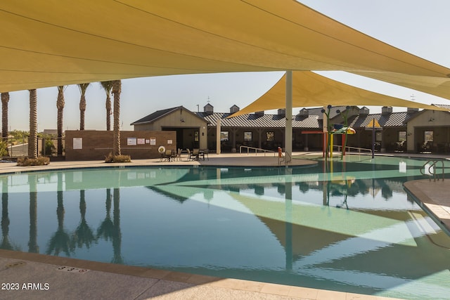 view of swimming pool featuring a patio area