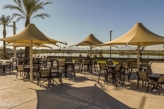 view of patio / terrace featuring a water view