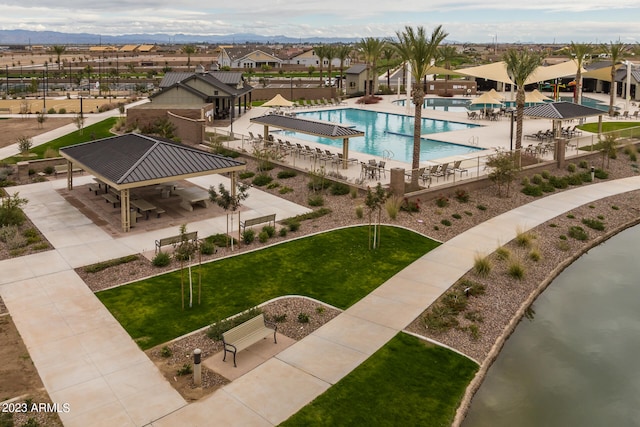 view of pool featuring a lawn and a gazebo