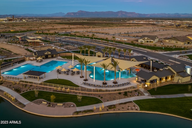 birds eye view of property featuring a mountain view