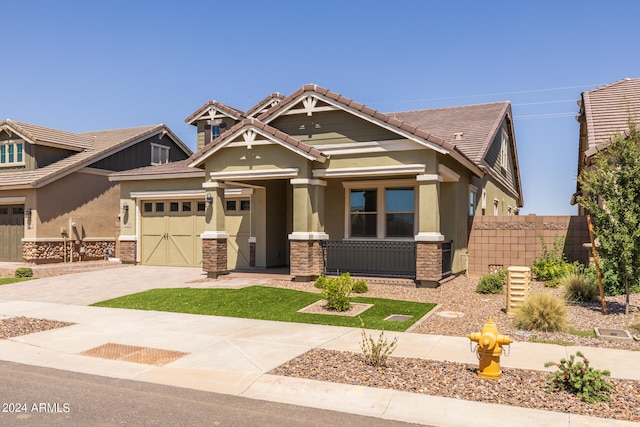 craftsman inspired home with a garage