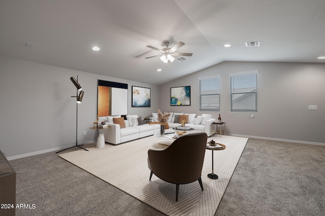 living room featuring lofted ceiling, carpet, and ceiling fan