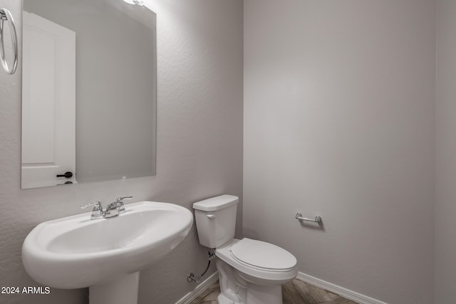 bathroom with sink and toilet