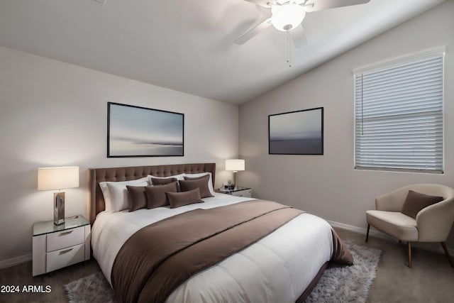 carpeted bedroom featuring ceiling fan and lofted ceiling