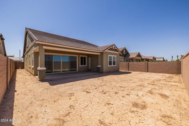 rear view of house with a patio area