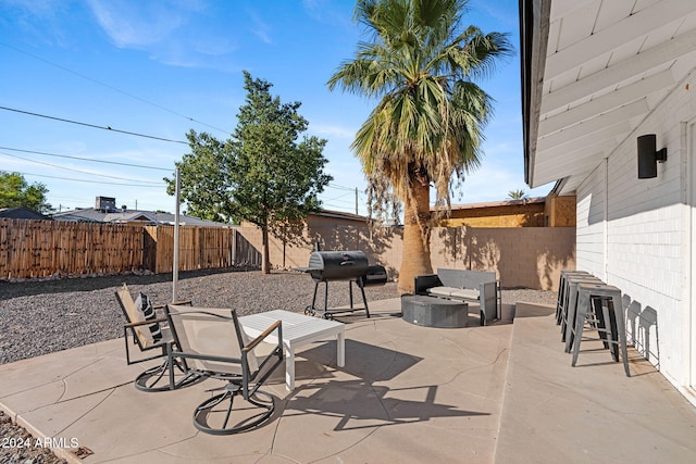 view of patio featuring a grill