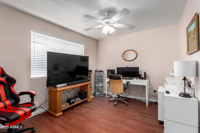 office space featuring ceiling fan and wood-type flooring