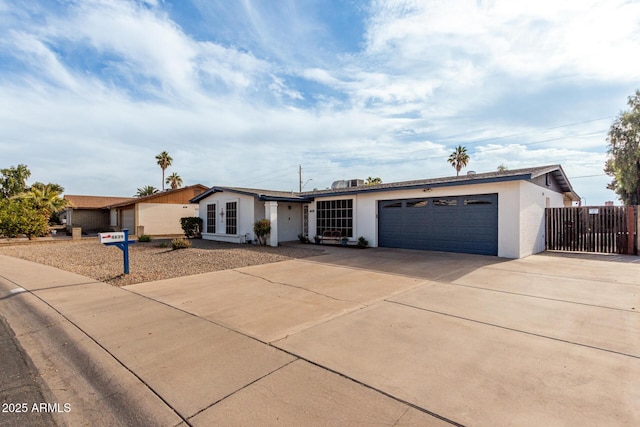 single story home with a garage