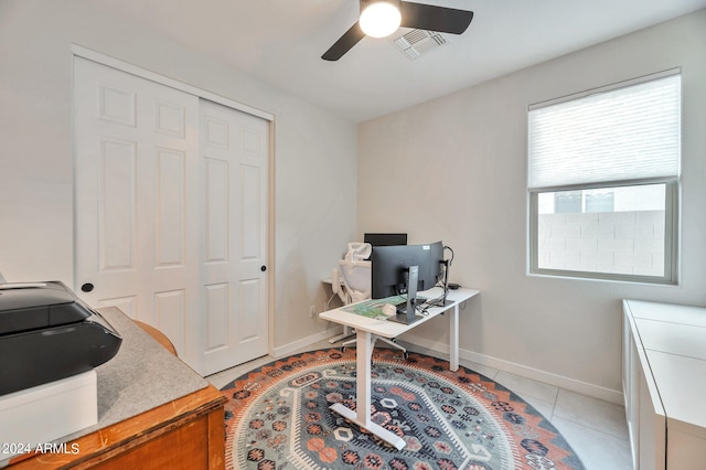 tiled office with ceiling fan