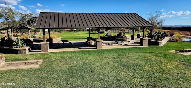 view of home's community featuring a lawn and a gazebo