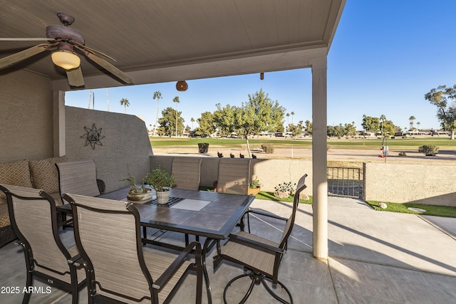 view of patio featuring ceiling fan