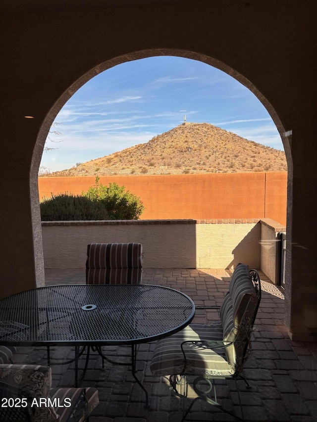 view of patio with a mountain view