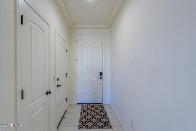 entryway with light tile patterned floors