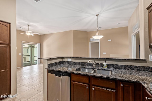 2725 E Mine Creek Rd Unit 2146, Phoenix, AZ 85024 - kitchen with stainless steel dishwasher, light tile patterned floors, pendant lighting, a ceiling fan, and dark stone countertops