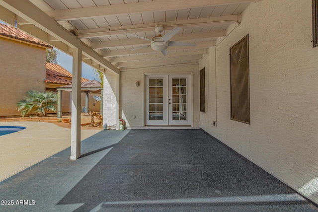 view of patio featuring french doors and ceiling fan