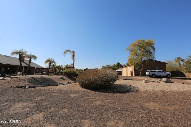 view of yard with a garage