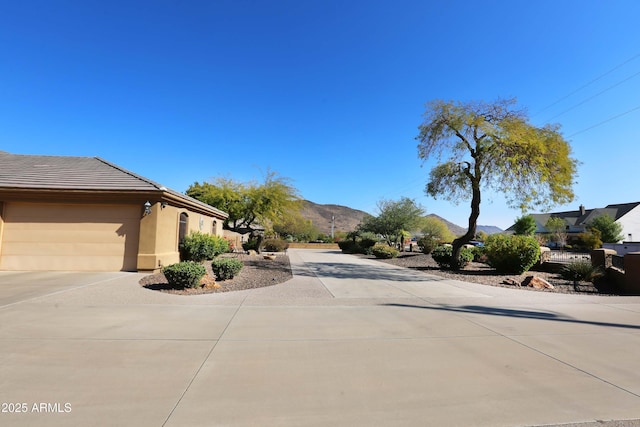 exterior space featuring a mountain view