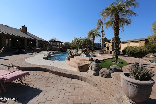 view of pool with a patio area