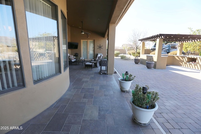 view of patio / terrace featuring a pergola