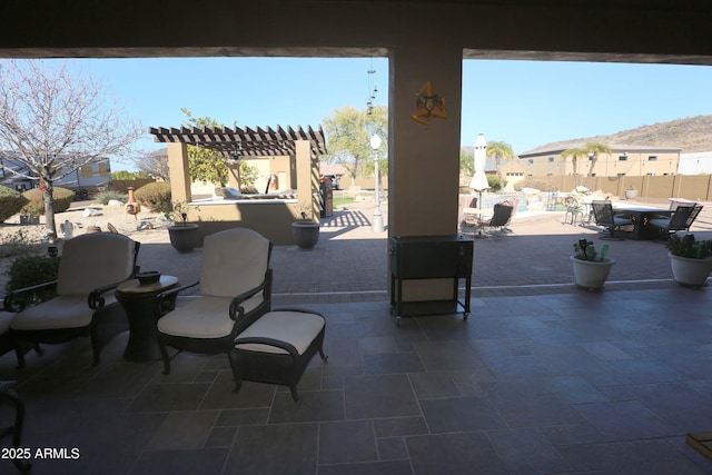 view of patio featuring a pergola