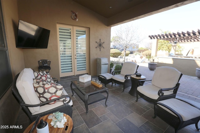 view of patio / terrace featuring french doors, outdoor lounge area, and a pergola