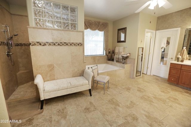 bathroom featuring vanity, shower with separate bathtub, and ceiling fan