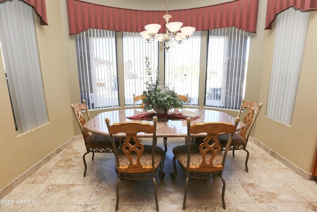 dining room featuring a chandelier