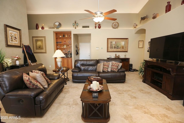 living room with ceiling fan