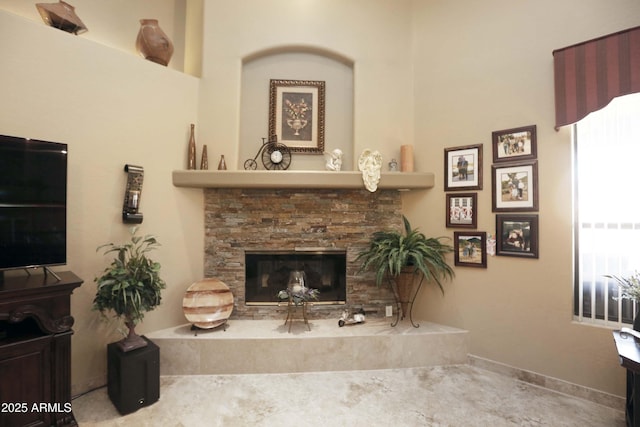 living room featuring a fireplace