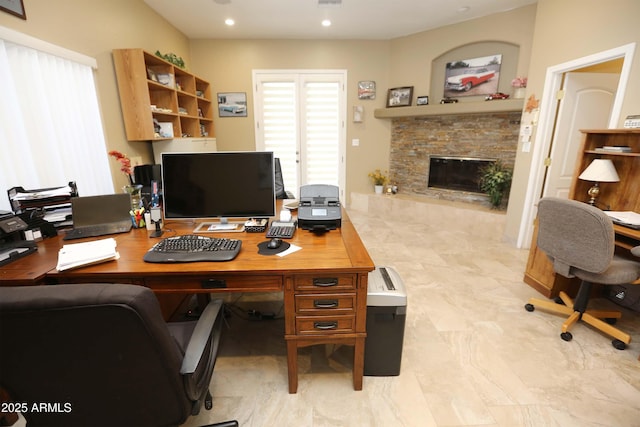 home office featuring a fireplace