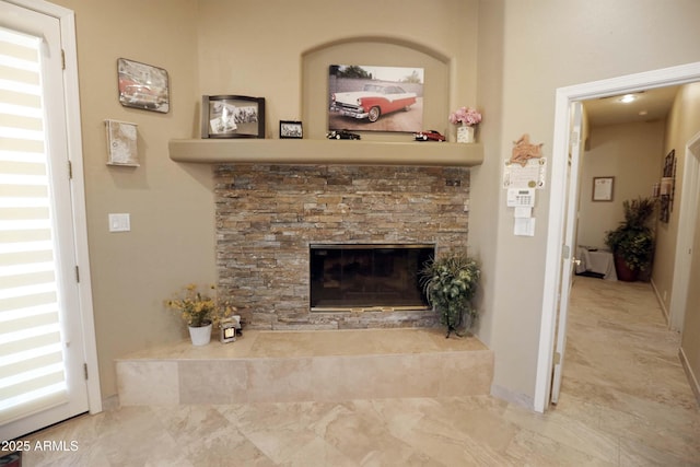 details featuring a stone fireplace