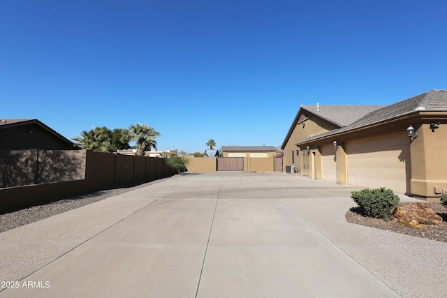 view of property exterior with a garage