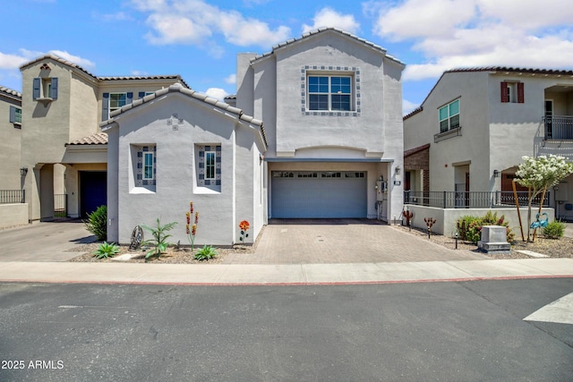 226 E Markwood Dr, Chandler, AZ 85286 - view of front of property featuring stucco siding, driveway, a garage, and a tile roof