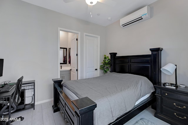 226 E Markwood Dr, Chandler, AZ 85286 - bedroom featuring a wall mounted AC, ensuite bath, baseboards, and a ceiling fan