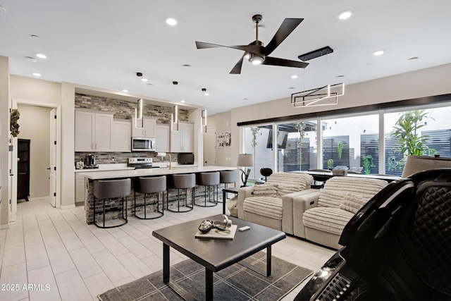 226 E Markwood Dr, Chandler, AZ 85286 - living area featuring a ceiling fan and recessed lighting