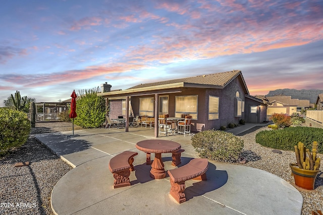 view of front facade featuring a patio area