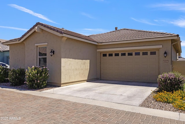 4302 E Cynthia St, Gilbert, AZ 85295 - ranch-style house featuring concrete driveway, a garage, stucco siding, and a tile roof